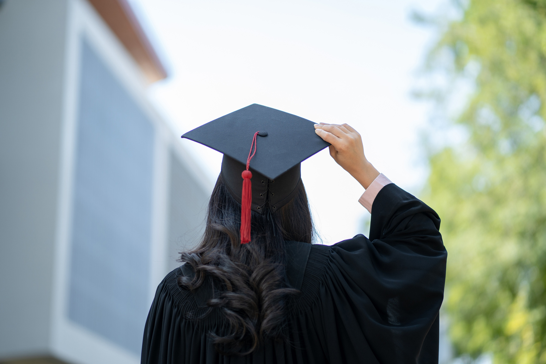 Graduation Day, Back View of Asian Woman with Graduation Cap and